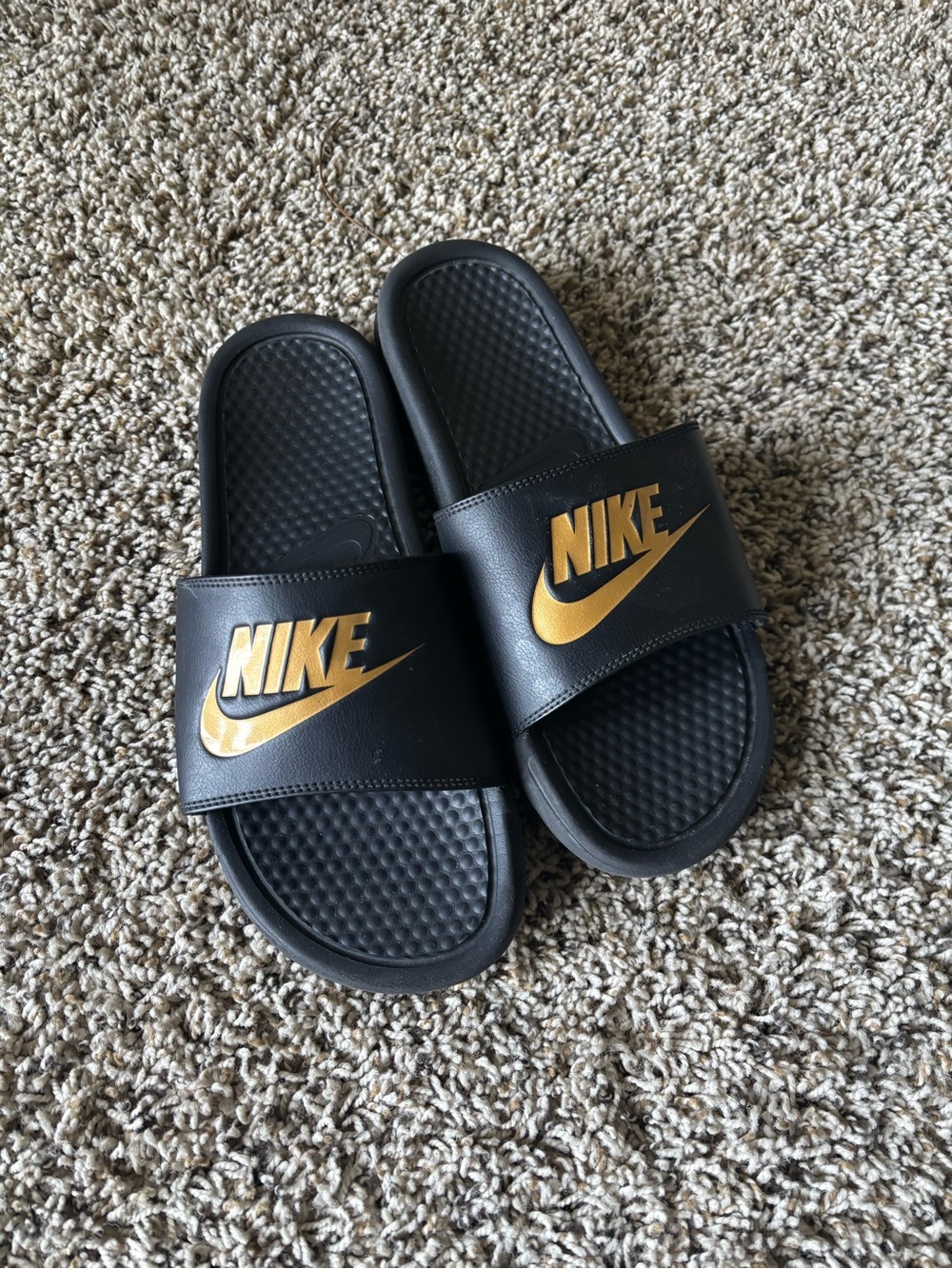 Nike Black and Gold Slide Sandals